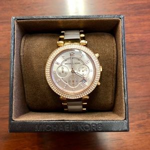 Michael Kors rose gold and like pink watch.